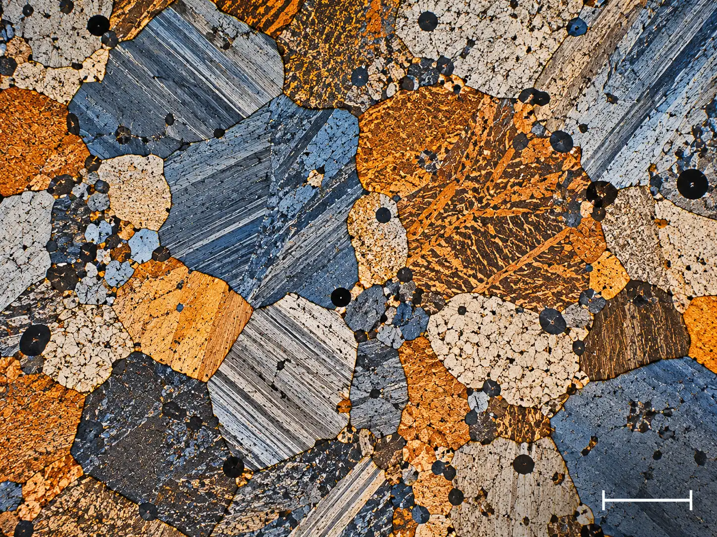 Metallography grain-structure analysis showing grain boundaries, phases, and microstructural features